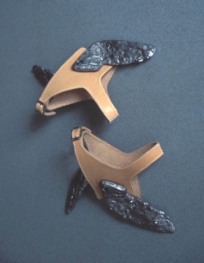 Shoes of Hermes made of leather straps with lead wings